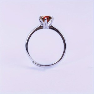Anillo de compromiso en plata detalle de borde efecto perlado con granate Anillo de compromiso en plata detalle de borde efecto perlado con granate