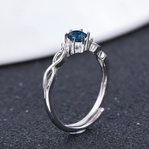Anillo de compromiso en plata clásico infinito con zafiro Anillo de compromiso en plata clásico infinito con zafiro